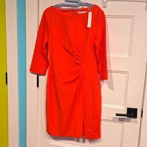 Trina Turk orange shift dress, leg silt, ruching at waist. 3/4 sleeves NWT new W